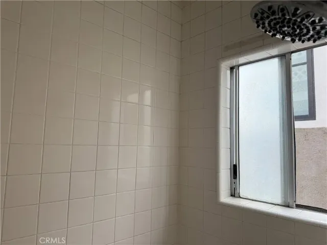 a bathroom with a sink and vanity