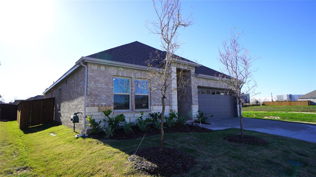 1374 Chisos Way Forney, TX 75126 - Photo 3 of 25 a house view with a garden space