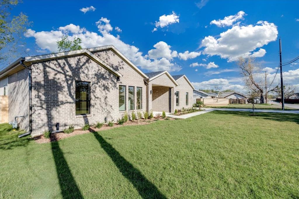 1507 Elk Creek Road Dallas, TX 75253 - Photo 40 of 40 a view of a house with a big yard
