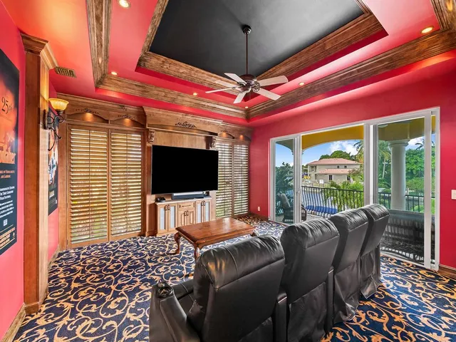 a view of a livingroom with furniture and a flat screen tv