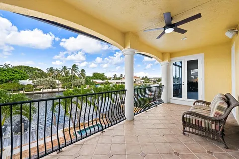 a porch with a table in balcony