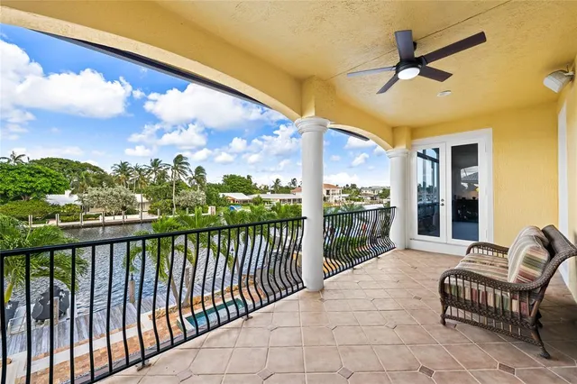 a porch with a table in balcony