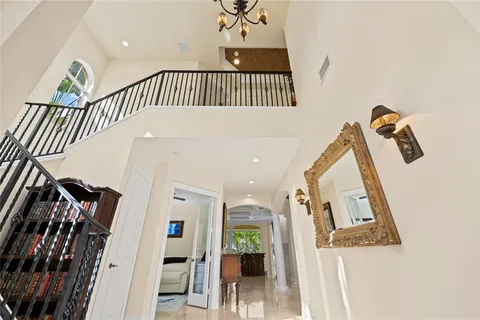 a view of a hallway with a livingroom