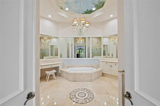 a spacious bathroom with a toilet sink and mirror