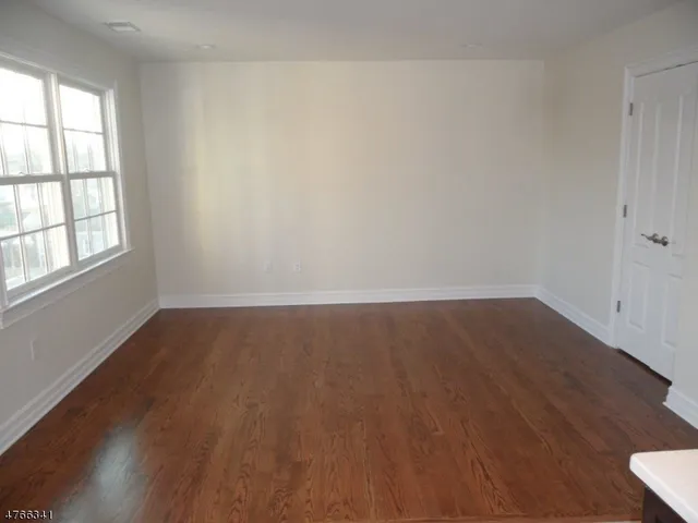 a kitchen with a sink and a stove top oven