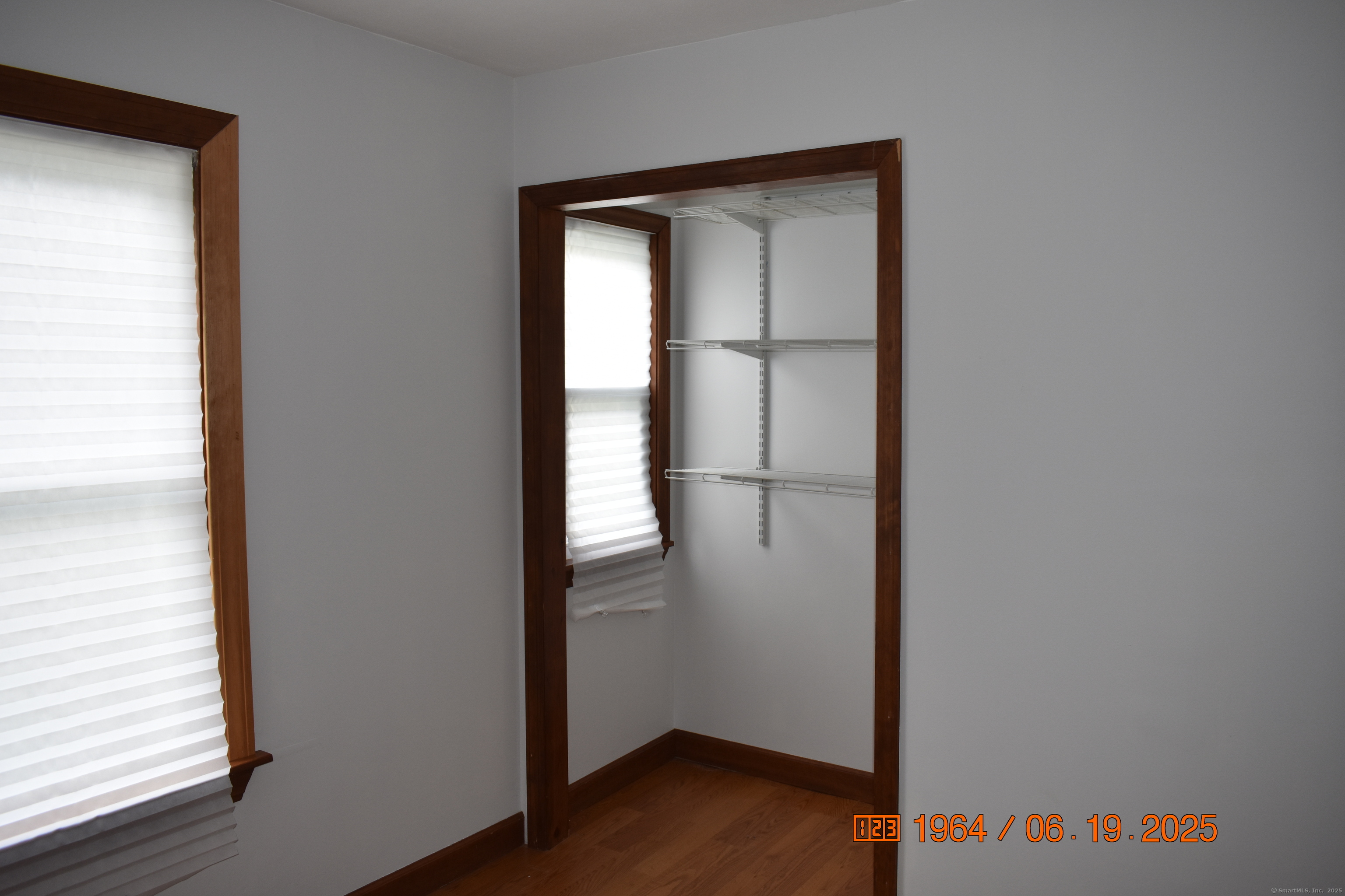 39 Highland Avenue Beacon Falls, CT 06403 - Photo 12 of 17 a view of front door with wooden floor