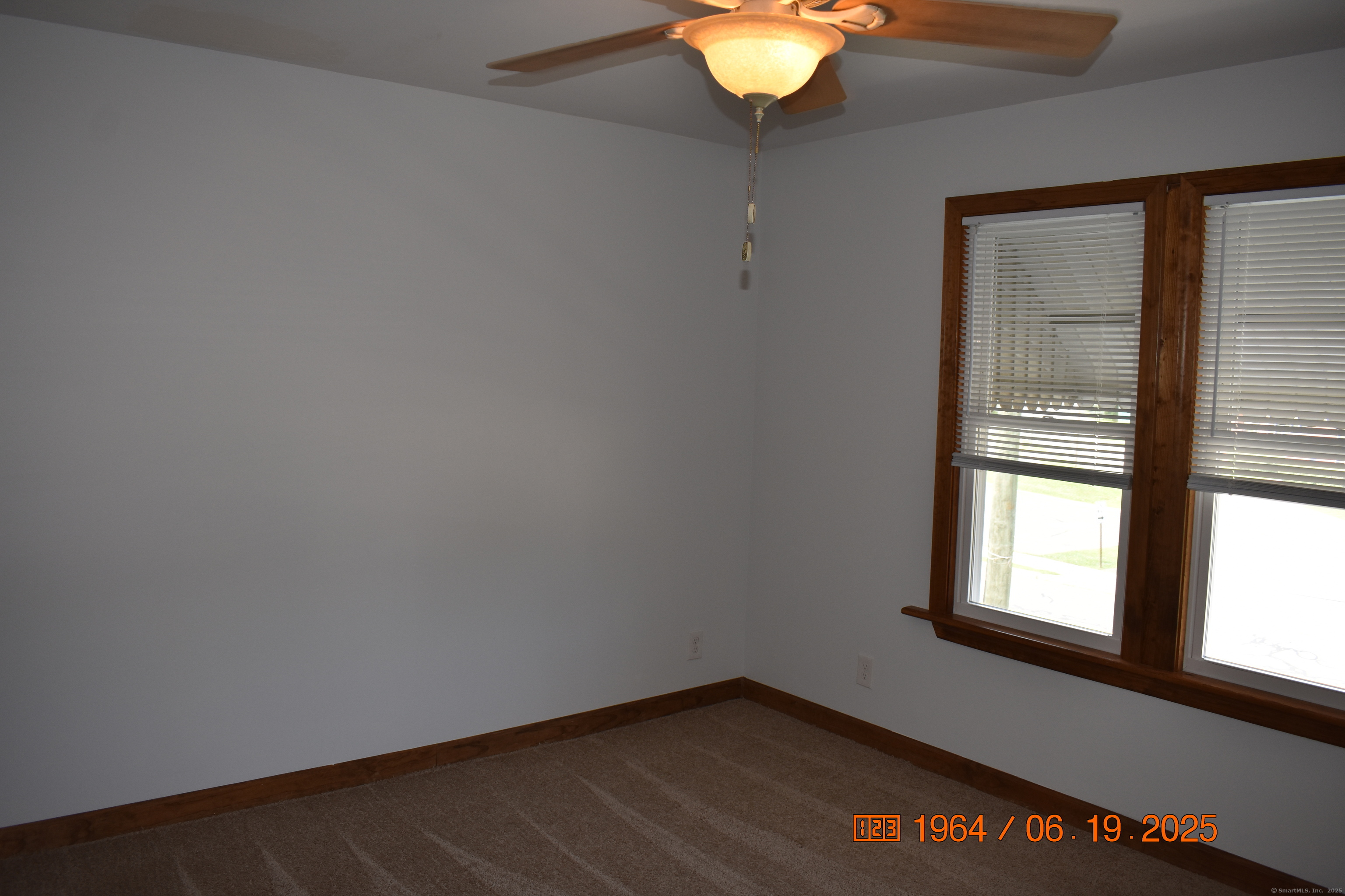 39 Highland Avenue Beacon Falls, CT 06403 - Photo 14 of 17 an empty room with a window