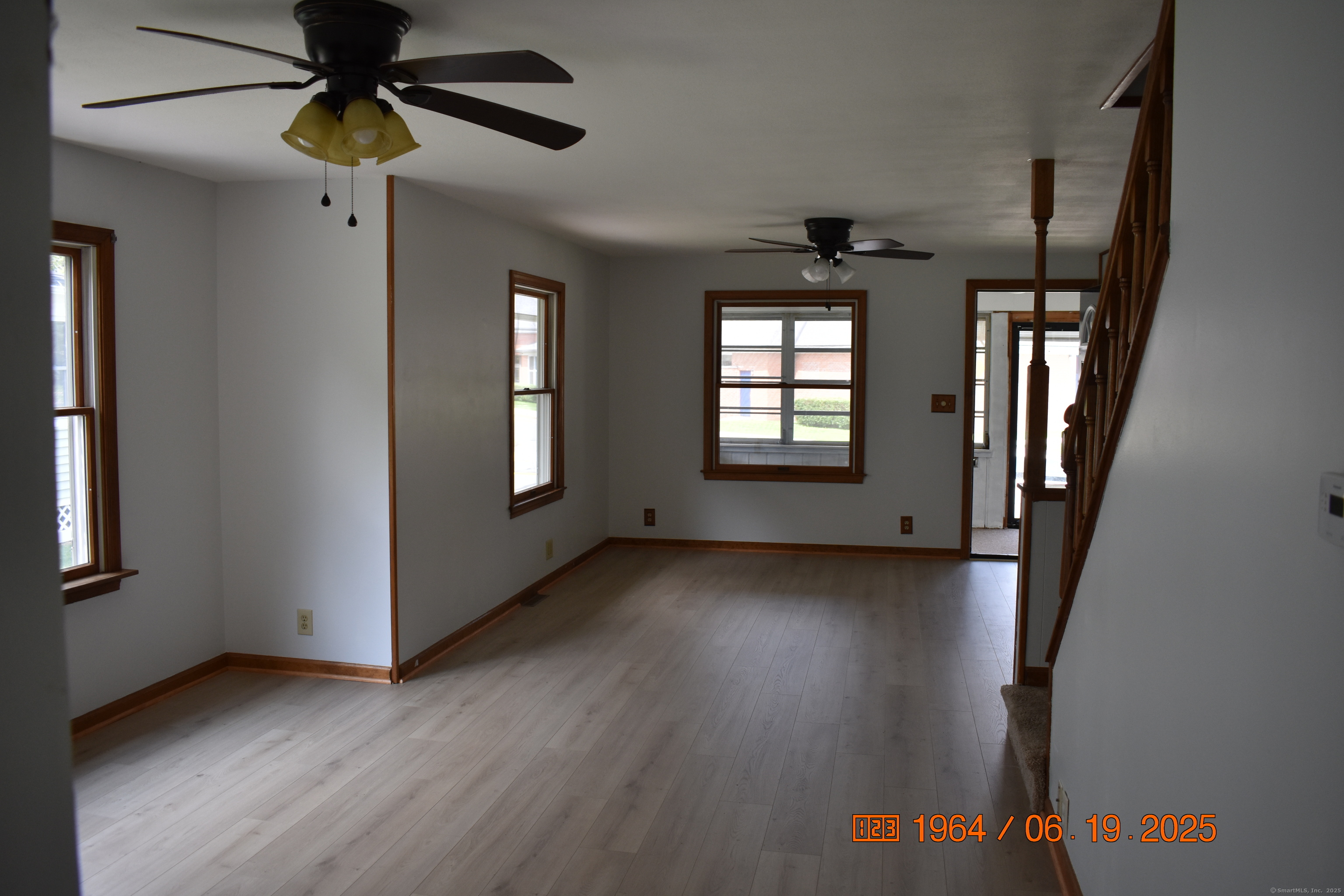 39 Highland Avenue Beacon Falls, CT 06403 - Photo 4 of 17 wooden floor in an empty room with a window