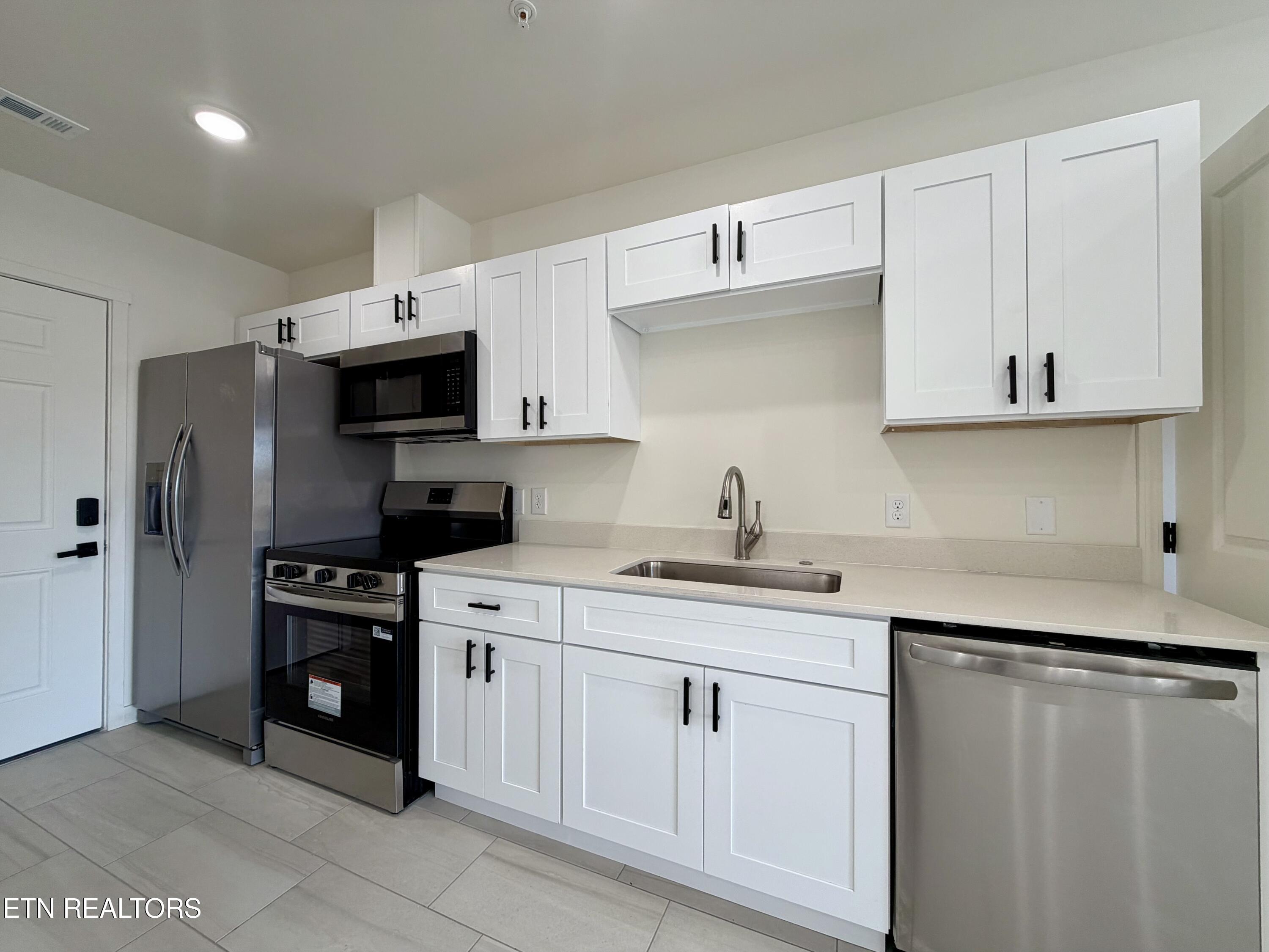 129 Sugarfoot Way, Unit 403 Pigeon Forge, TN 37863 - Photo 2 of 8 IMG_9840