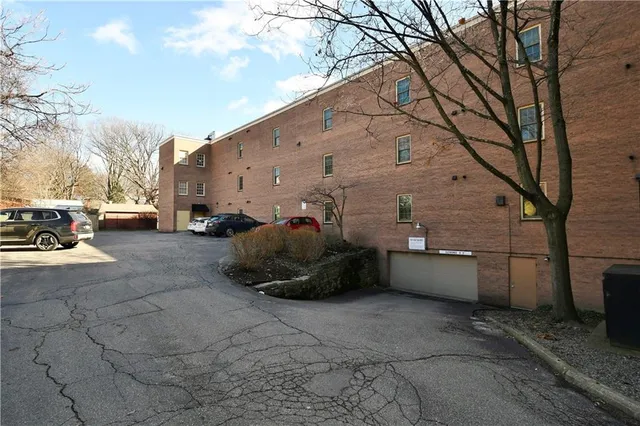 a view of a street with cars