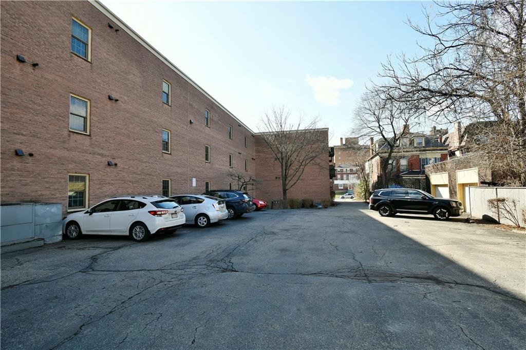 425 North Neville Street, Unit 204 Pittsburgh, PA 15213 - Photo 33 of 38 a view of street with parked cars