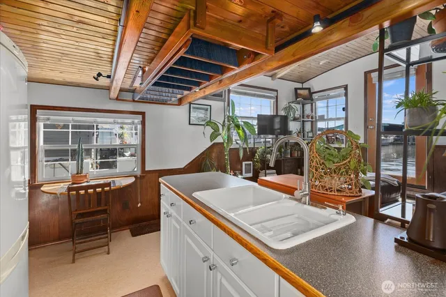 a kitchen with a stove and cabinets