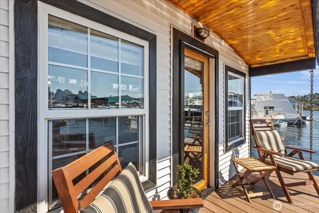 a view of a chairs and table in patio
