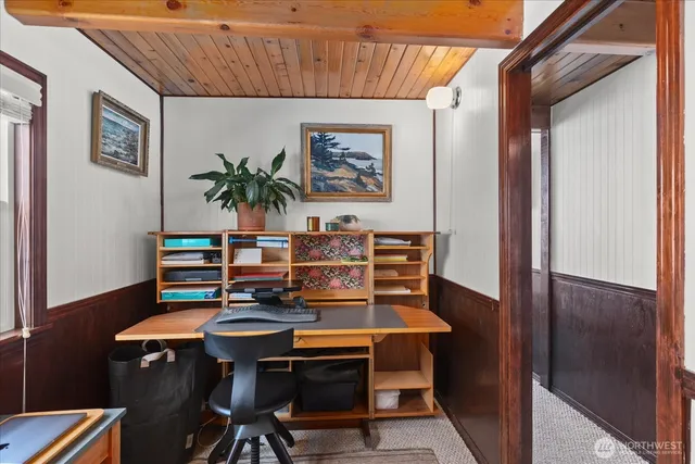 a view of a workspace with furniture