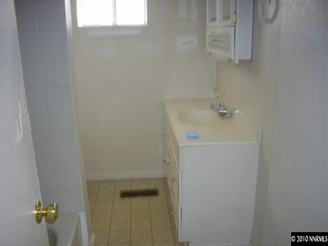 1865-7 Montello Street Reno, NV 89512 - Photo 5 of 9 a bathroom with a shower