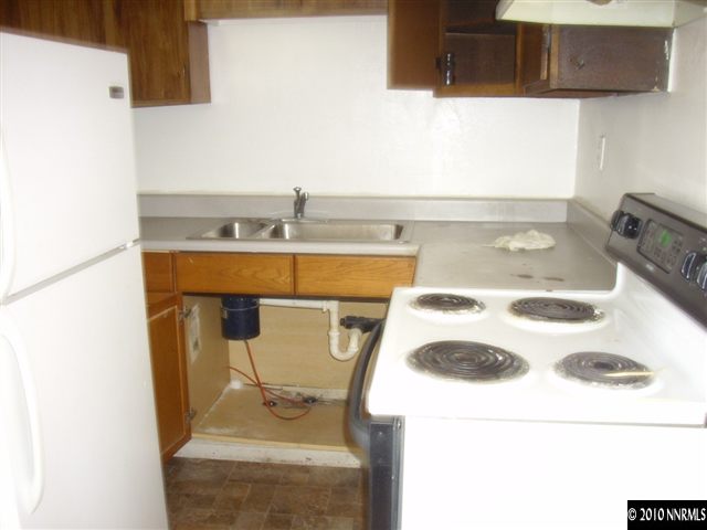 1865-7 Montello Street Reno, NV 89512 - Photo 8 of 9 a utility room with dryer and washer