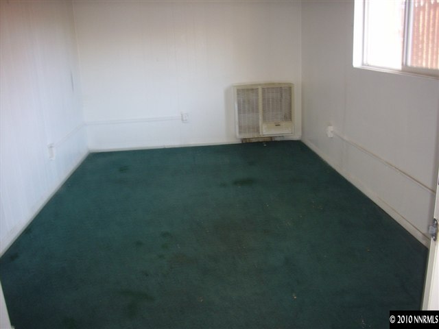 1865-7 Montello Street Reno, NV 89512 - Photo 9 of 9 an empty room with a empty space and window
