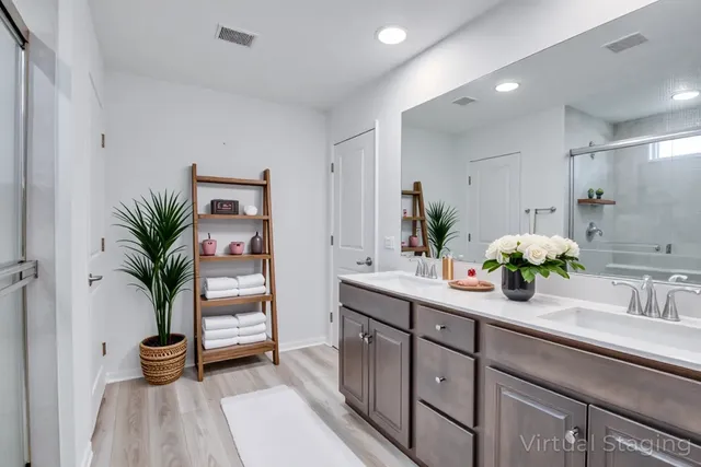 a kitchen with a potted plant on the counter