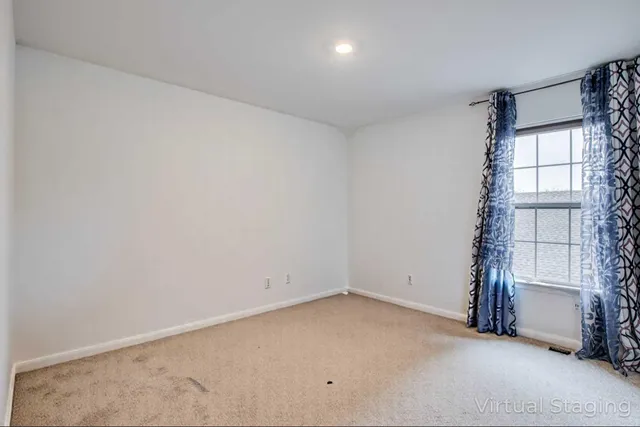 an empty room with a empty space and empty shelves