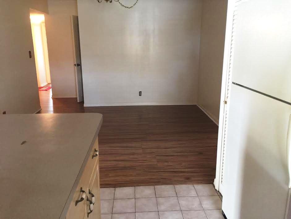 1100 Northwest 13th Street, Unit 276D Boca Raton, FL 33486 - Photo 11 of 23 dining room to kitchen