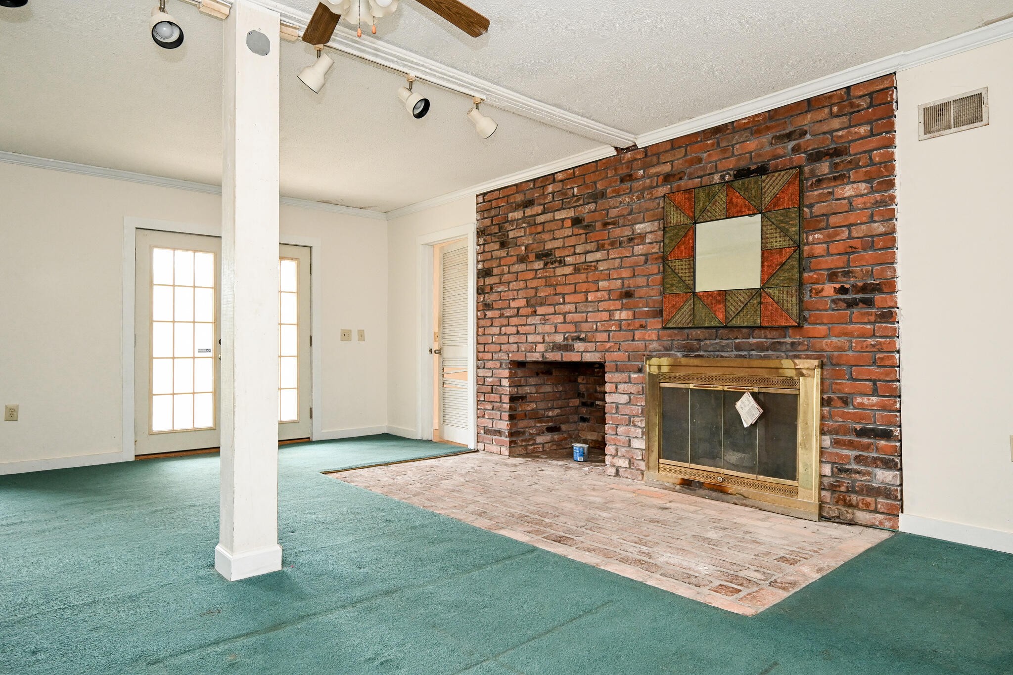 2464 No Pone Road Northwest Georgetown, TN 37336 - Photo 26 of 50 a view of empty room with fireplace and wooden floor