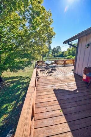2464 No Pone Road Northwest Georgetown, TN 37336 - Photo 37 of 50 a view of a wooden deck with a yard