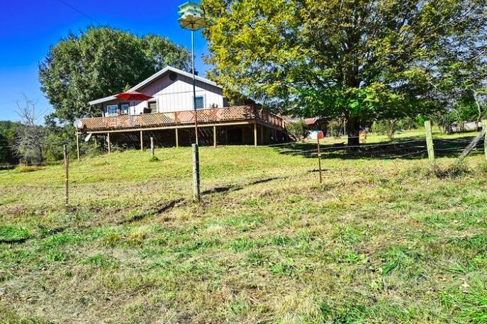 2464 No Pone Road Northwest Georgetown, TN 37336 - Photo 39 of 50 a view of a house with a yard