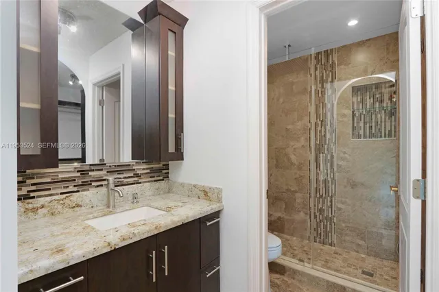 a view of a room with large windows