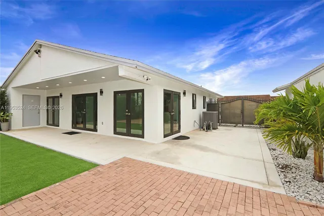 a house with a tree in front of it