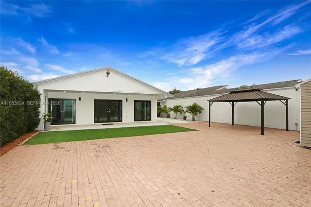 a front view of a house with a patio