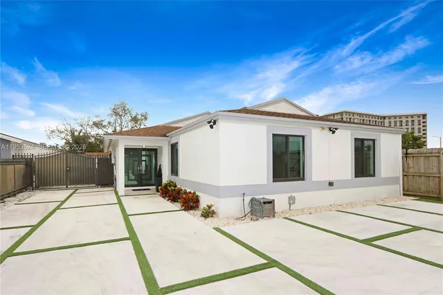a front view of a house with a patio