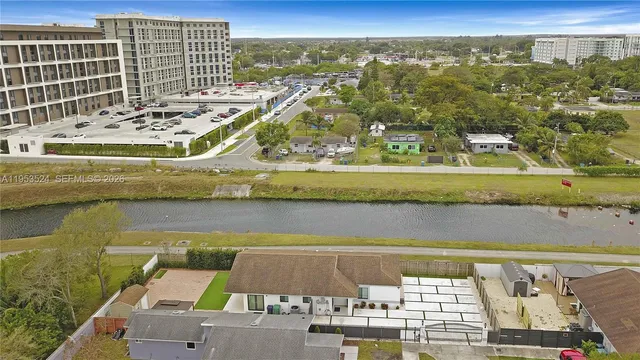 a view of swimming pool with a balcony