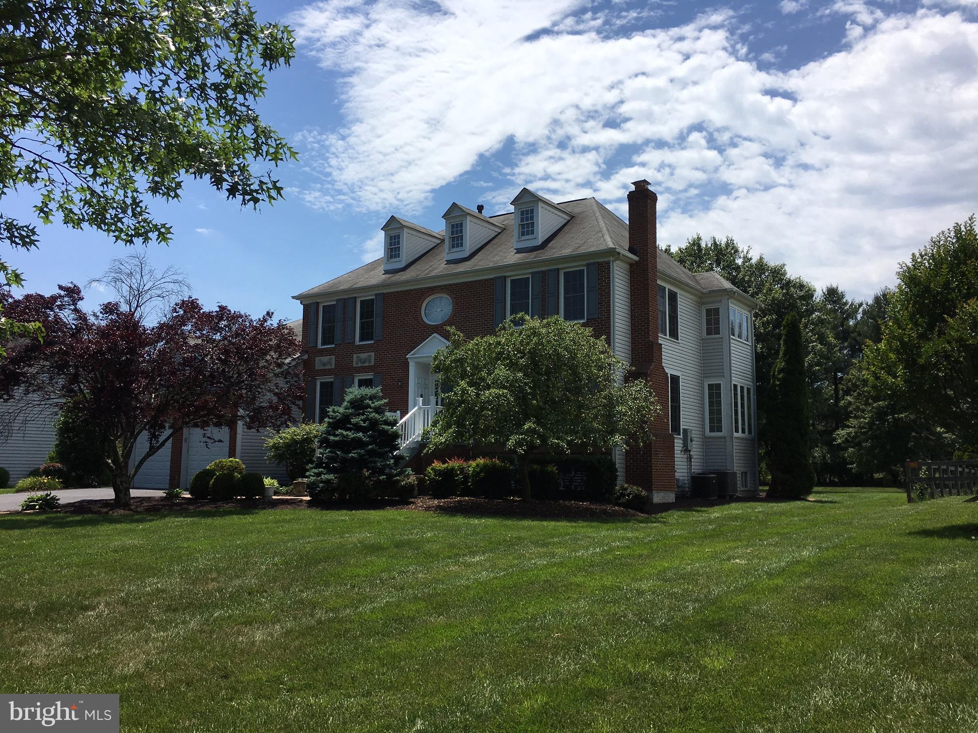 17106 Campbell Farm Road Poolesville, MD 20837 - Photo 2 of 30 a front view of house with garden