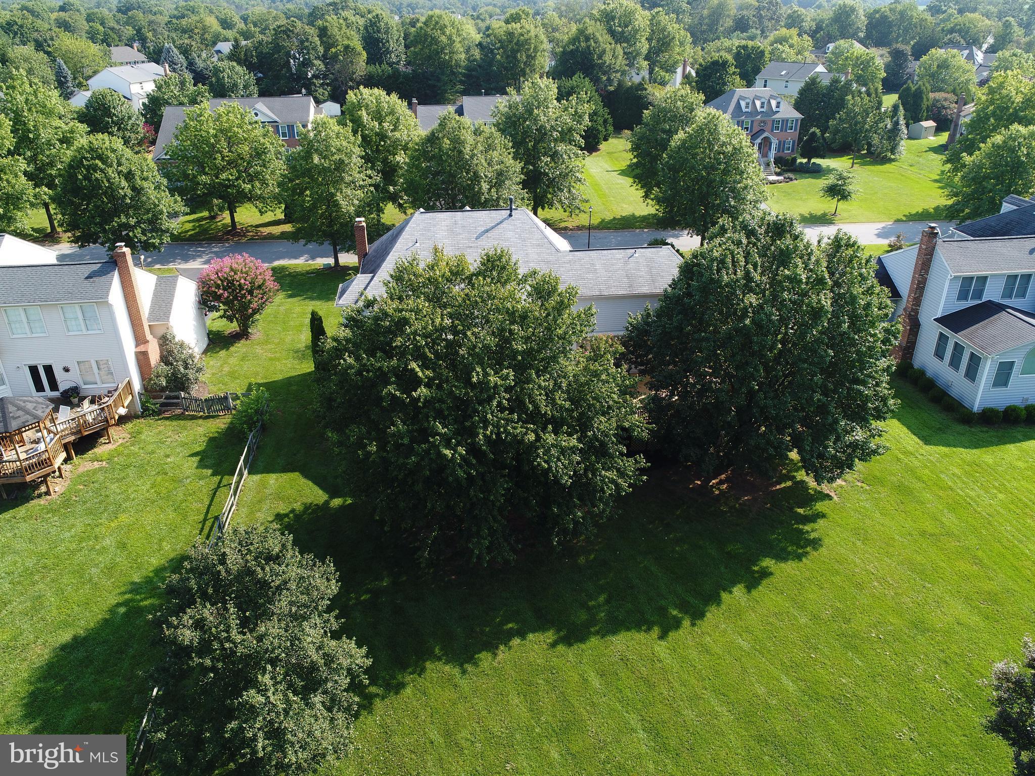 17106 Campbell Farm Road Poolesville, MD 20837 - Photo 3 of 30 a view of a lake with houses