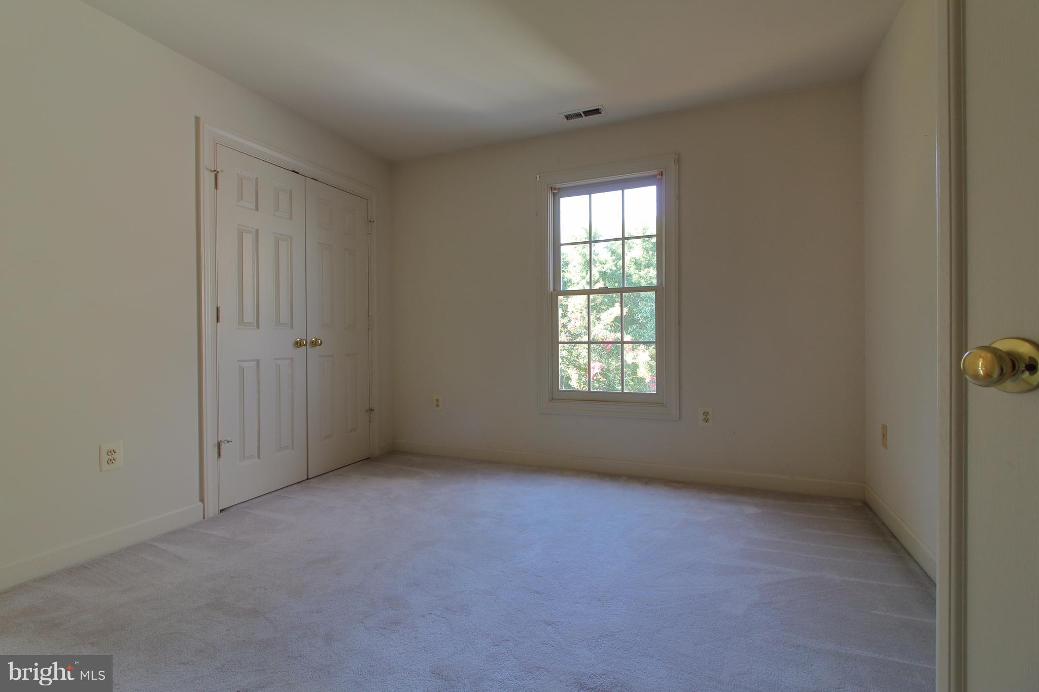 17106 Campbell Farm Road Poolesville, MD 20837 - Photo 23 of 30 an empty room with windows