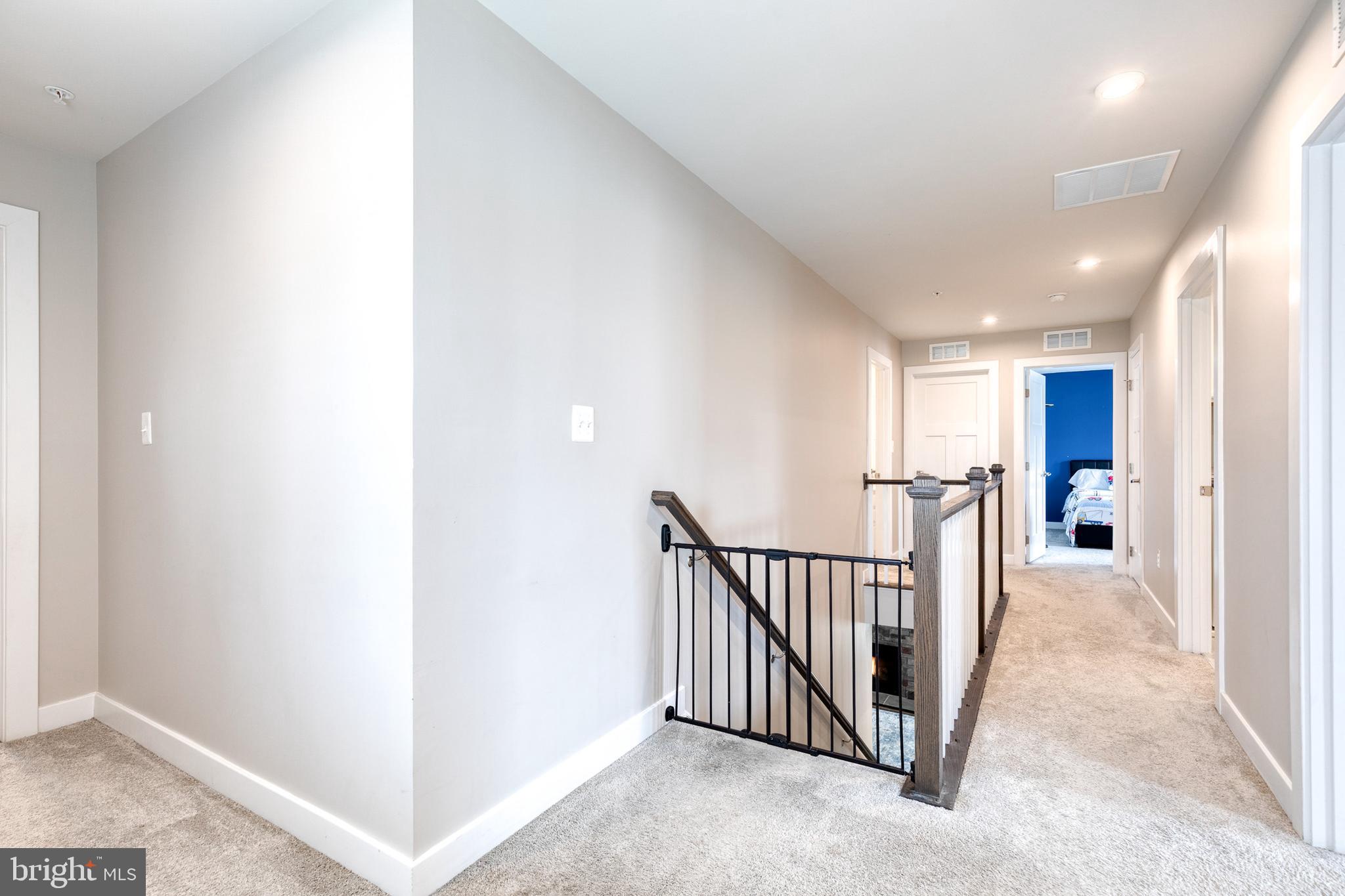 6003 Valentine Way Hanover, MD 21076 - Photo 46 of 52 a view of a hallway with a livingroom