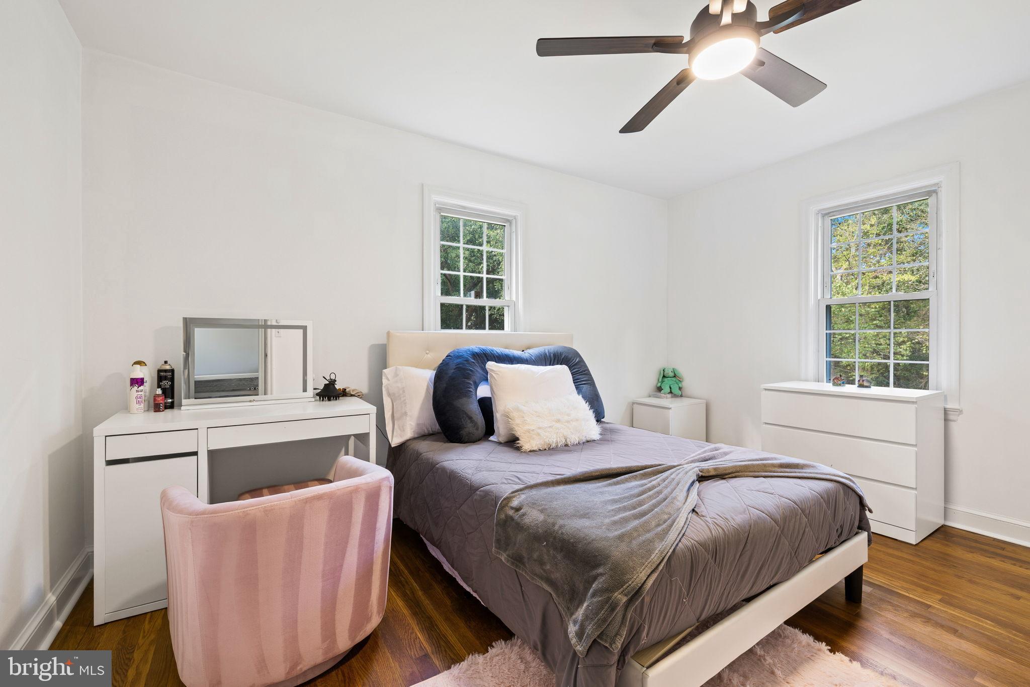 4440 Dumfries Road Catlett, VA 20119 - Photo 18 of 38 a bedroom with a bed and a chandelier