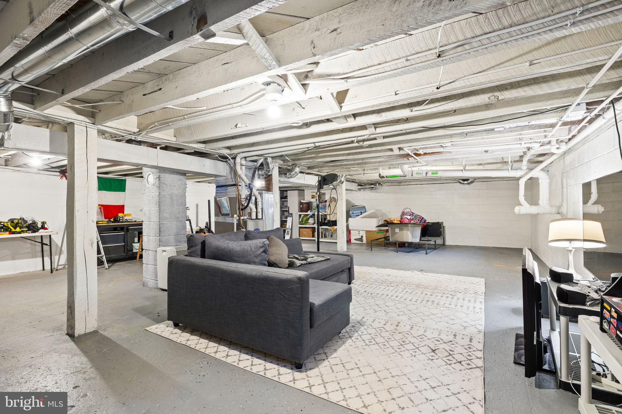 4440 Dumfries Road Catlett, VA 20119 - Photo 20 of 38 a living room with furniture and a view of the kitchen