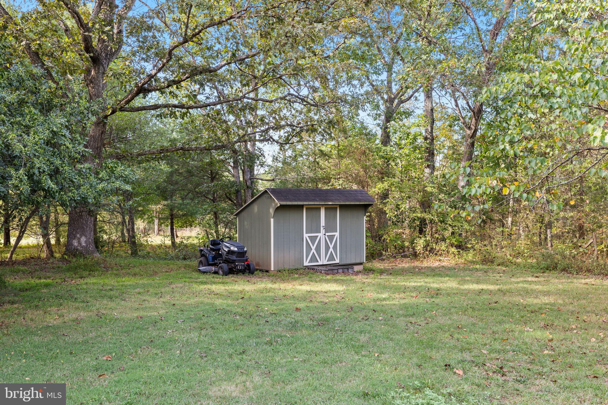 4440 Dumfries Road Catlett, VA 20119 - Photo 25 of 38 a front view of a house with a yard