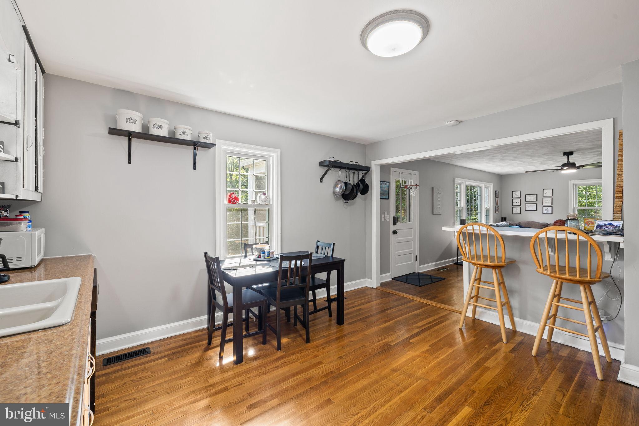 4440 Dumfries Road Catlett, VA 20119 - Photo 9 of 38 a view of a dining room with furniture and wooden floor