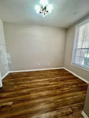 a view of an empty room with window