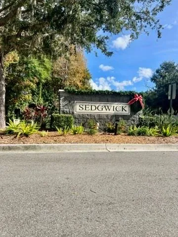 a view of a street with a building in the background