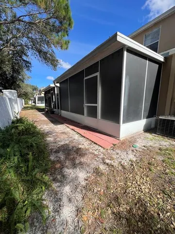 a view of a backyard of the house
