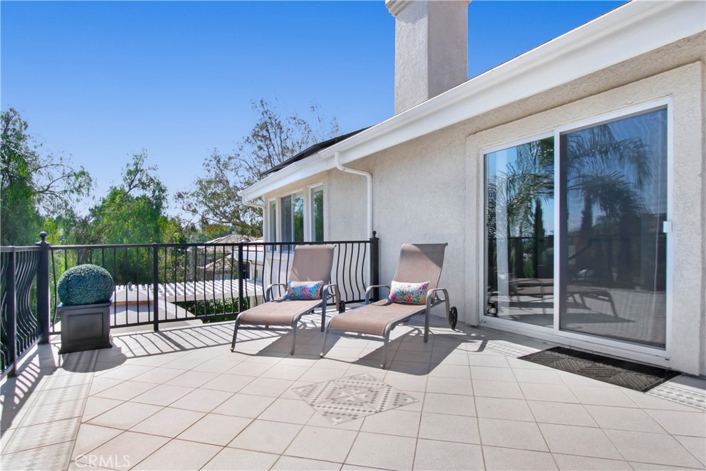 12036 Wood Ranch Road Granada Hills, CA 91344 - Photo 24 of 55 Primary Suite Balcony with Spiral staircase