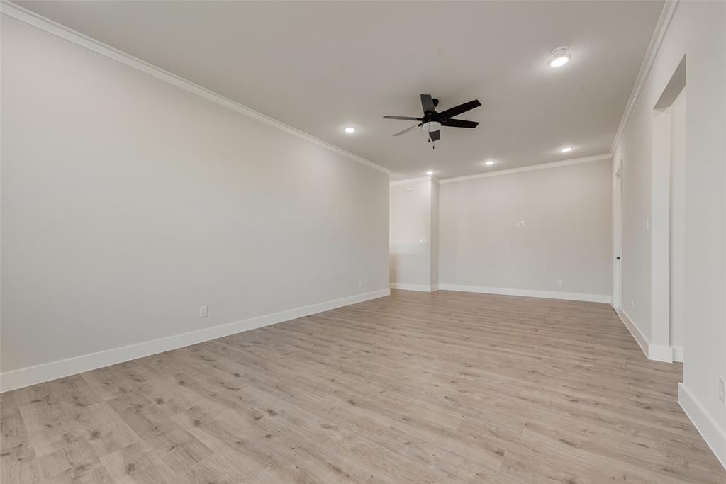 1342 Benjamin Trail Van Alstyne, TX 75495 - Photo 29 of 39 an empty room with a ceiling fan & a ceiling fan