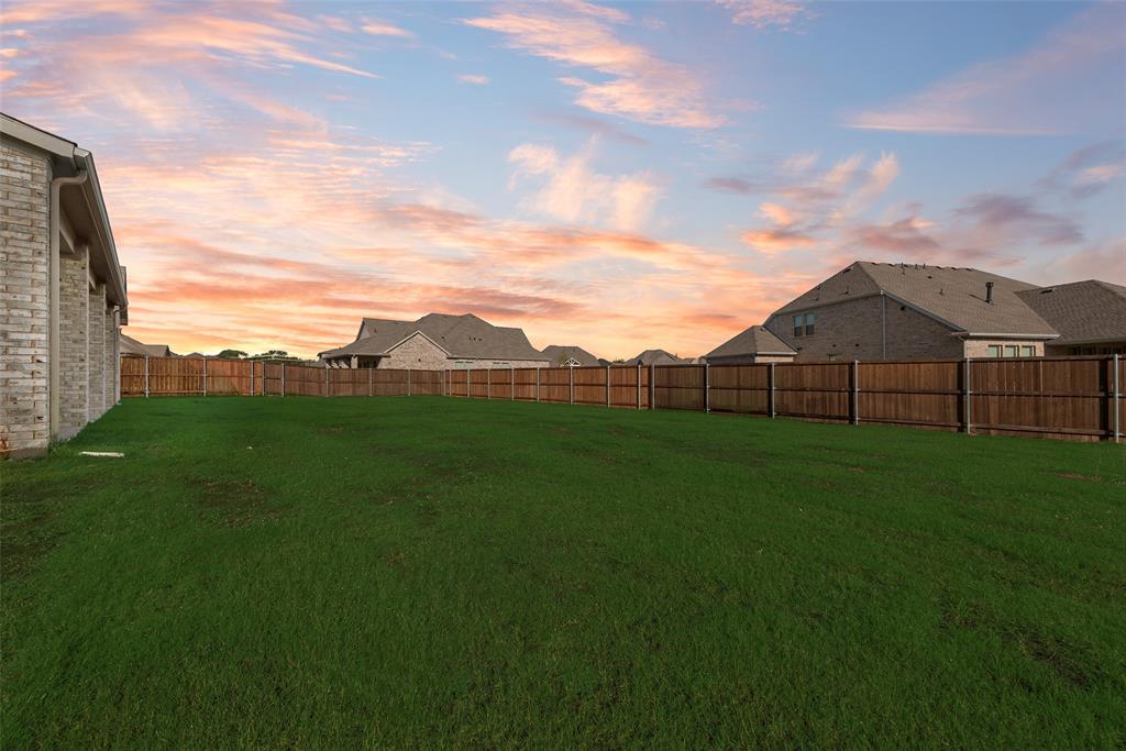 1342 Benjamin Trail Van Alstyne, TX 75495 - Photo 38 of 39 a view of a back yard