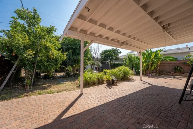 a view of a living room and entryway