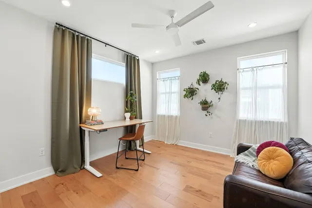 a bathroom with a glass shower door