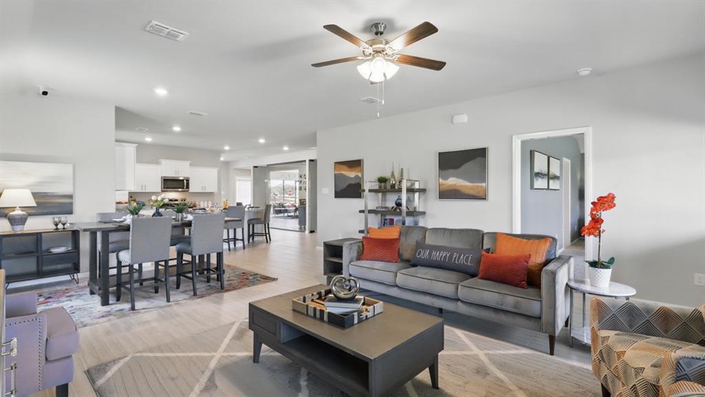 1636 Tin Roof Road Krum, TX 76249 - Photo 13 of 35 a living room with furniture and kitchen view