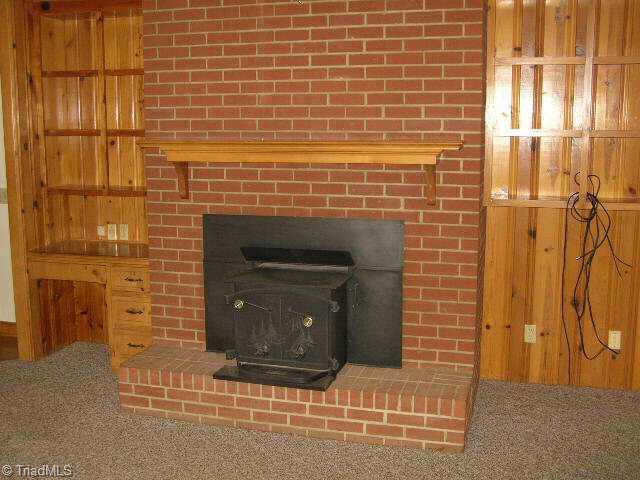 342 Culler Road Pinnacle, NC 27043 - Photo 5 of 9 Other. Lovely Den with built-in desk, shelves and Woodstove insert